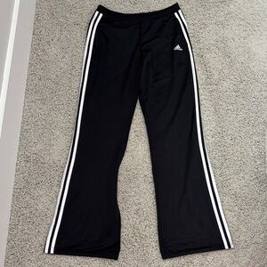 Adidas woman’s Black straight leg Joggers with White Stripes